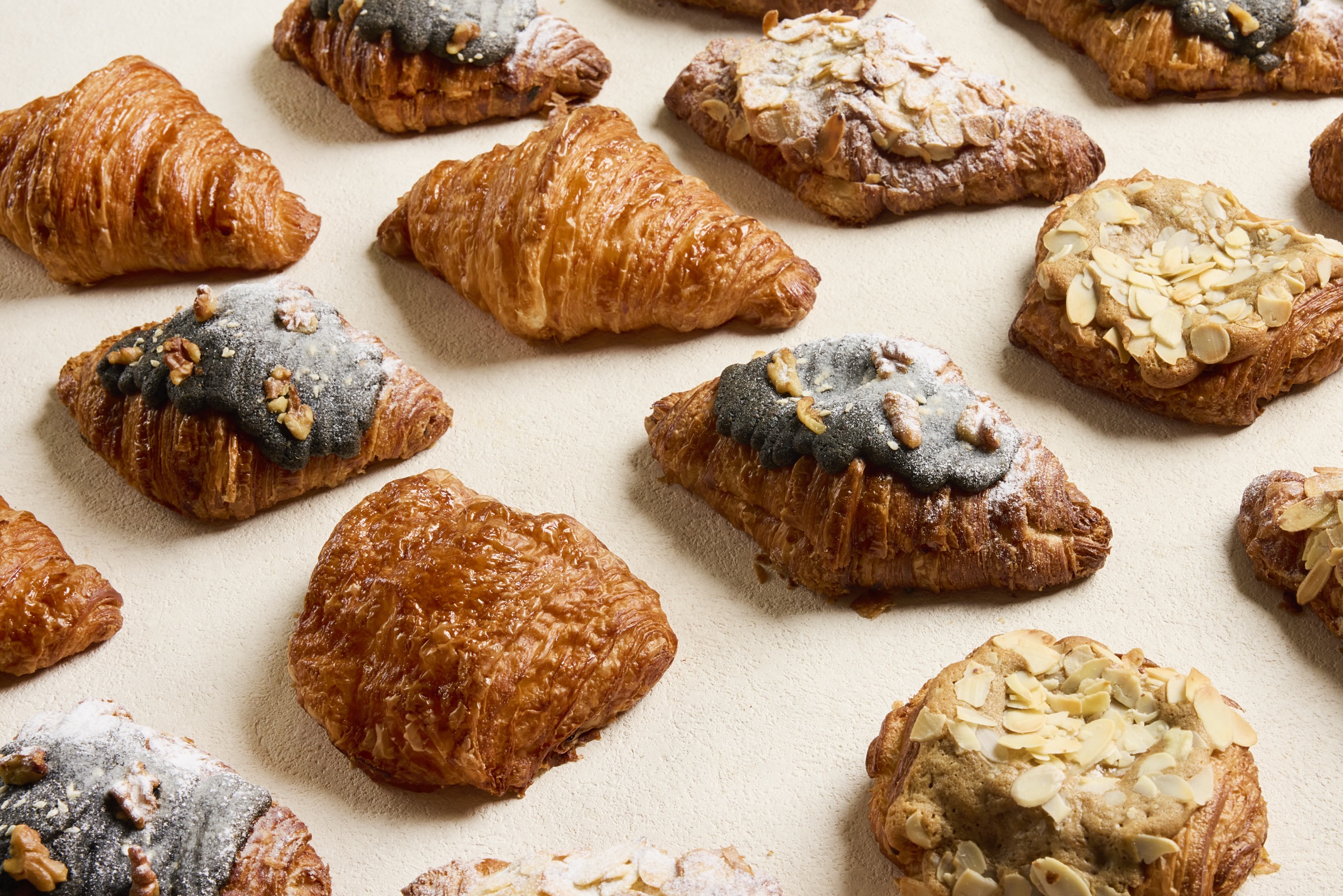 Variety of freshly baked croissants on display