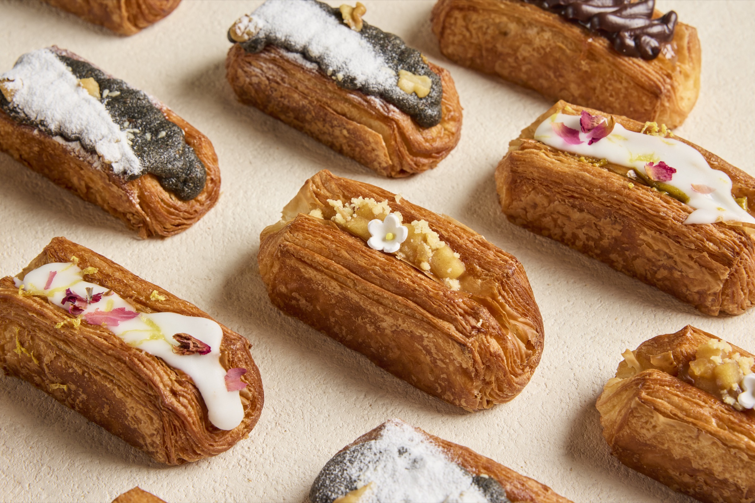 Spread of artisan pastries and croissants for office catering